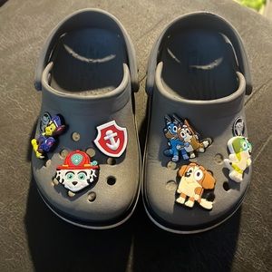 Toddler gray and blue crocs with brand new paw patrol and bluey charms